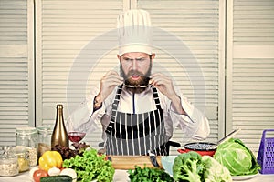 Culinary is exciting. Chef handsome hipster. Get ready. Man bearded chef getting ready cooking delicious dish. Chef at