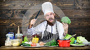 Culinary recipe concept. Man bearded hipster cooking fresh vegetables. Freshest possible ingredients. Chef use fresh