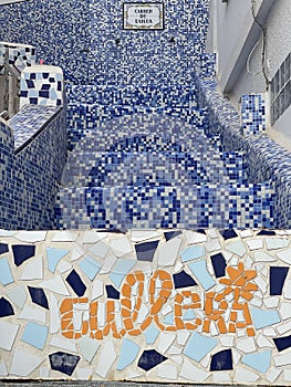 Cullera tourist sign on the blue stairs