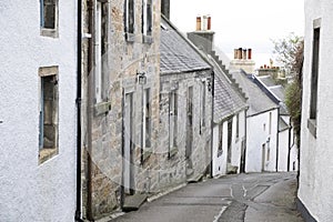 Culross fife Scottish village houses on road steep slope