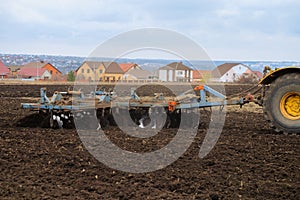 Cultivation of the soil with a disc harrow