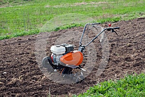 Cultivator on field.