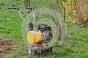 Cultivator for tillage in the garden,motor cultivator. Close-up