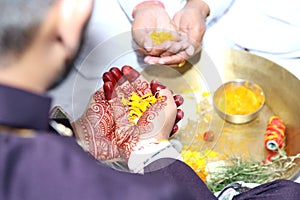 Cultural Indian Wedding with roli and Flowers