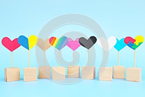 Cultural, racial, gender, age and general equality, inclusion, love and diversity concept. Multicolored heart shape icons in blue