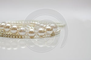 Cultured pearls on white