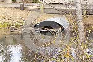 Culvert Pipe Under Road From Stream Oxbow in Park