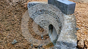 Culverts are installed under the bridge to facilitate water drainage