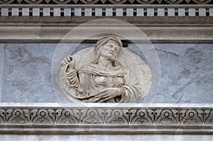 Cumaean Sibyl, relief on the portal of the Cathedral of Saint Lawrence in Lugano