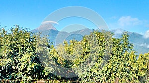 Cumbre del Nevado de Colima coronada por nube solitaria photo