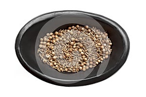 Cumin and Coriander Seeds in Black Bowl Isolated