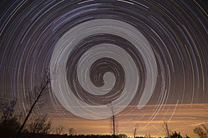 Cumulative time lapse of star trails in night sky