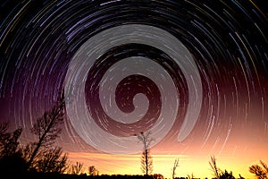 Cumulative time lapse of star trails in night sky