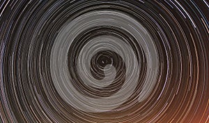 Cumulative timelapse of star trails in night sky. photo