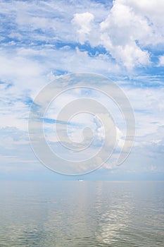 Cumuli white clouds and calm water Sea of Azov photo