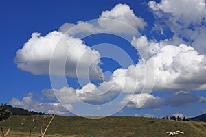 Cumulo nimbus clouds and Pyrenean landscape, France