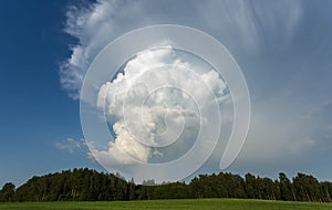 Cumulonimbus capillatus incus cloud, isolated storm cloud