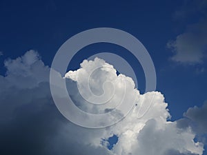 Cumulonimbus cloud formations on tropical blue sky