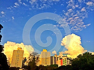 Cumulonimbus clouds above residential buildings