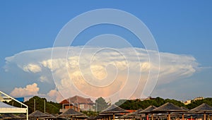 Cumulonimbus incus cloud in a shape of a mushroom from a nuclear war.