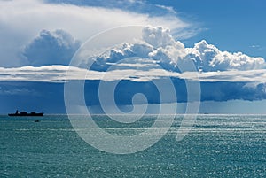 Cumulonimbus with Torrential Rain on the Horizon over the Sea