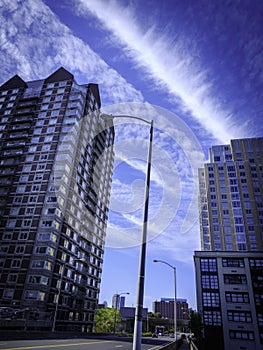 Cumulous Clouds over the Modern Buildings in Silhouette