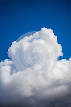 Cumulus cloud over blue sky