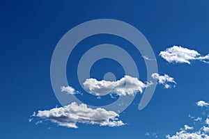 Cumulus clouds against blue sky