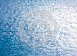 Cumulus clouds against blue sky at clear sunny day