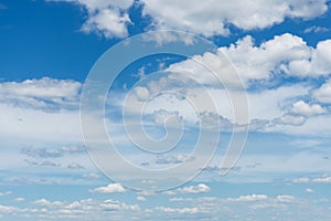 Cumulus clouds in blue sky, white fluffy clouds floating in blue sky