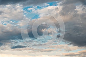 Cumulus clouds and gaps of clear blue sky