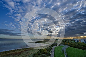 Cumulus clouds over an estuary