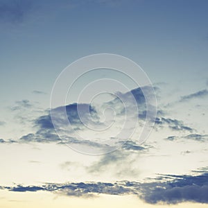 Cumulus clouds of the sunset with the sunset Blue sky blurred background defocusing