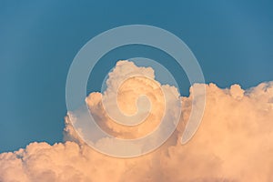 Cumulus congestus cloud on a blue sky.