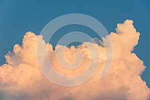 Cumulus congestus cloud on a blue sky.