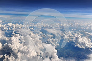 Cumulus and Cumulonimbus Clouds above the Earth