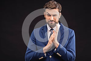 Cunning businessman preparing for profitable contract photo