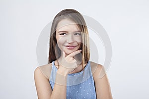 Cunning girl in blue dress