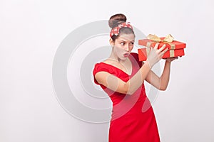 Cunning woman, looking inside gift box