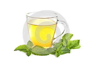 Cup with aromatic mint tea on white background