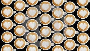 Cup of art cappuccino coffee heart symbol