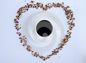 A cup of Black coffee and flowers with white background