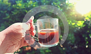 A cup of black hot java coffe in the morning