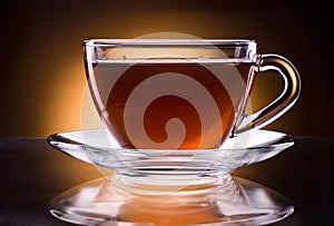 Cup of black tea isolated on dark background