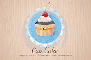 Cup cake chocolate cherry on table wood