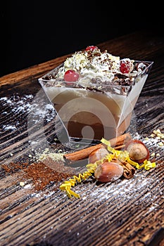 Cup cake with 3 layers on wood background