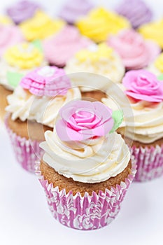 Cup Cakes With Colorful Icing or Frosting