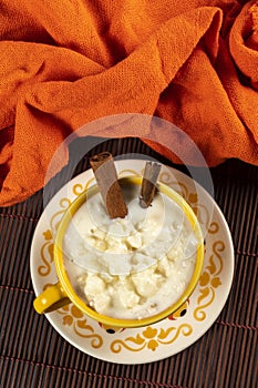 cup of canjica, typical food consumed in the Brazilian Festa Juninas