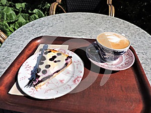 Cup of cappuccino and blueberry pie,  Suomenlinna, Finland