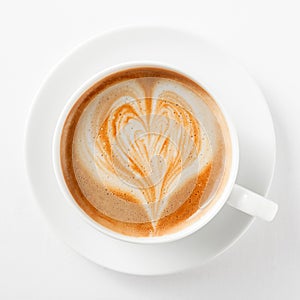 Cup of cappuccino coffee with a heart